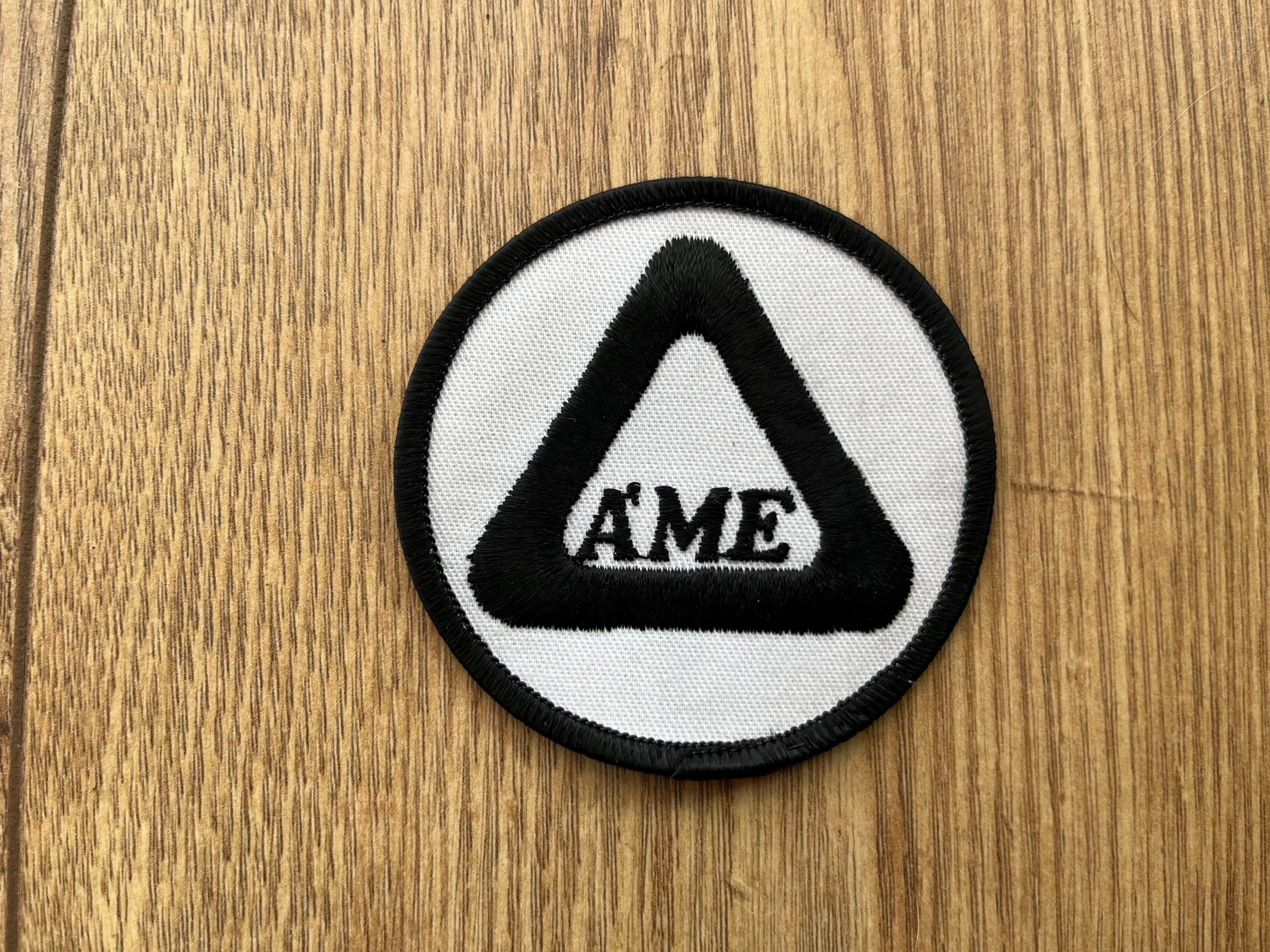 A'ME Round Sew On Patch NOS