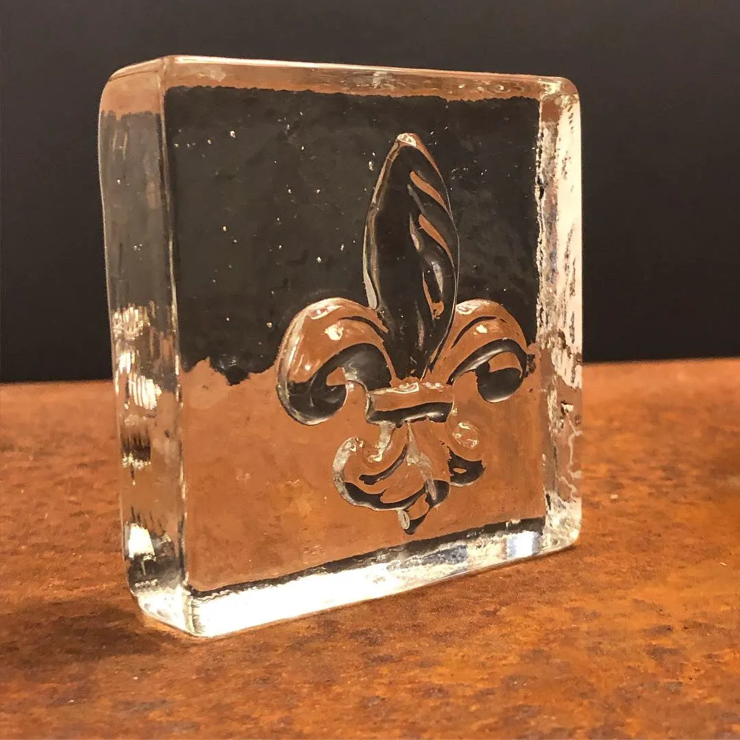 Fleur de lis paperweight
