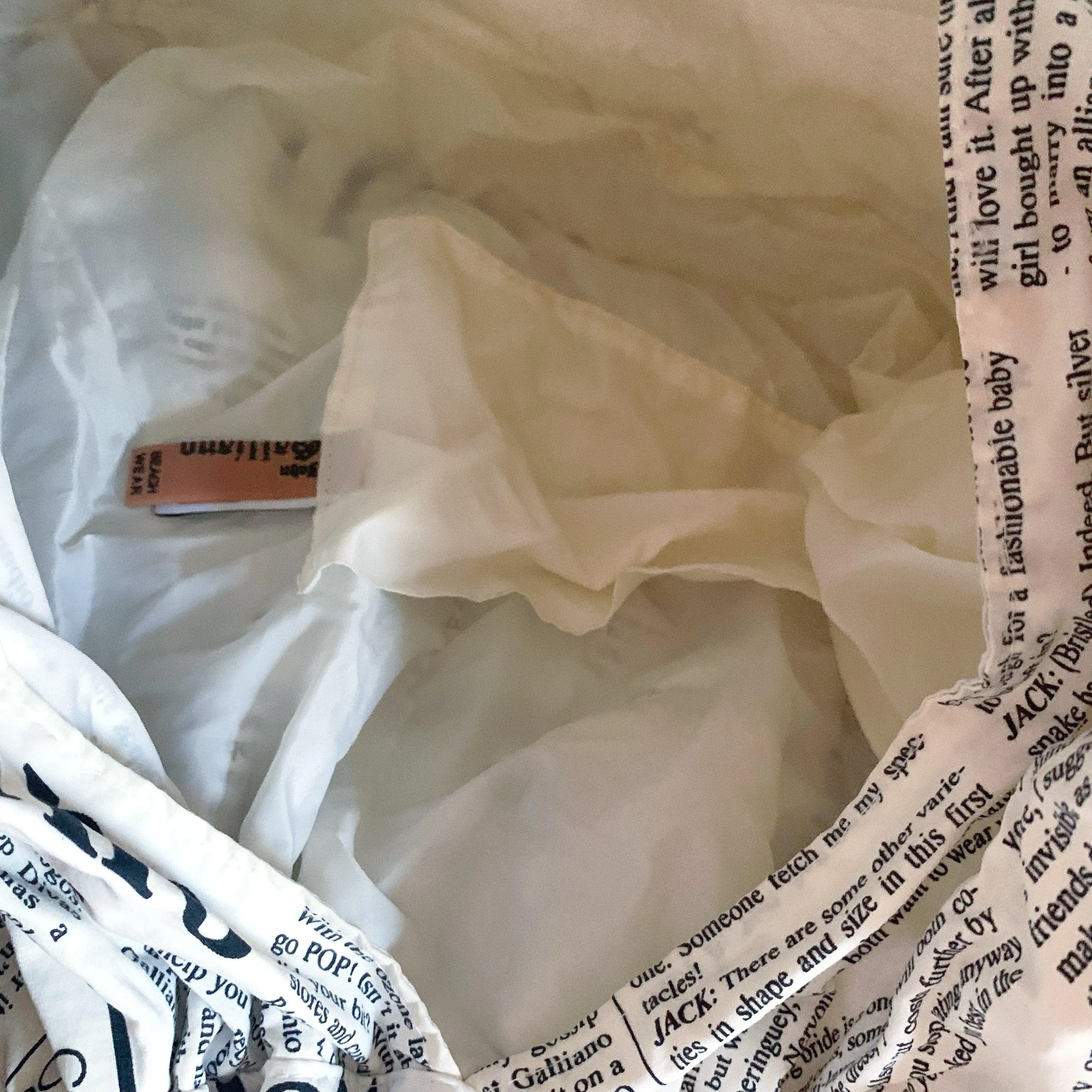 John Galliano White Newsprint Ring Handle Bag