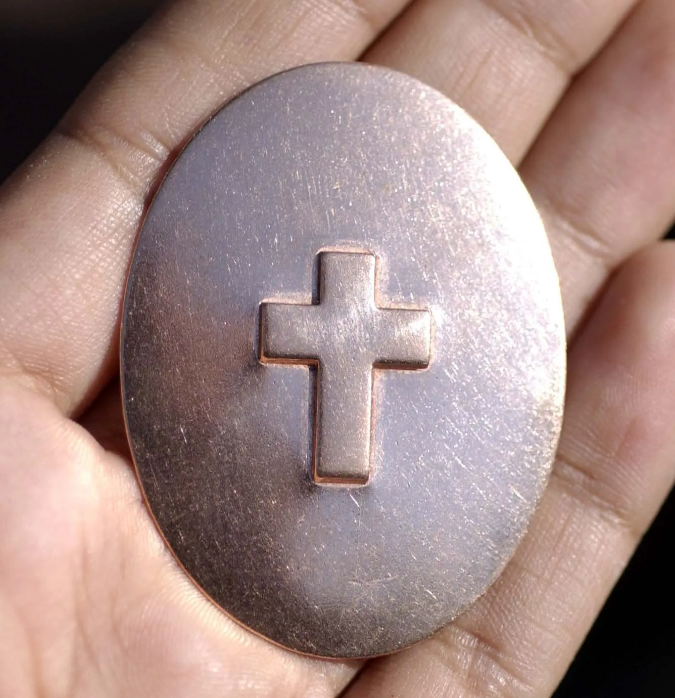 Large ovals with Cross Embossed on metal blanks