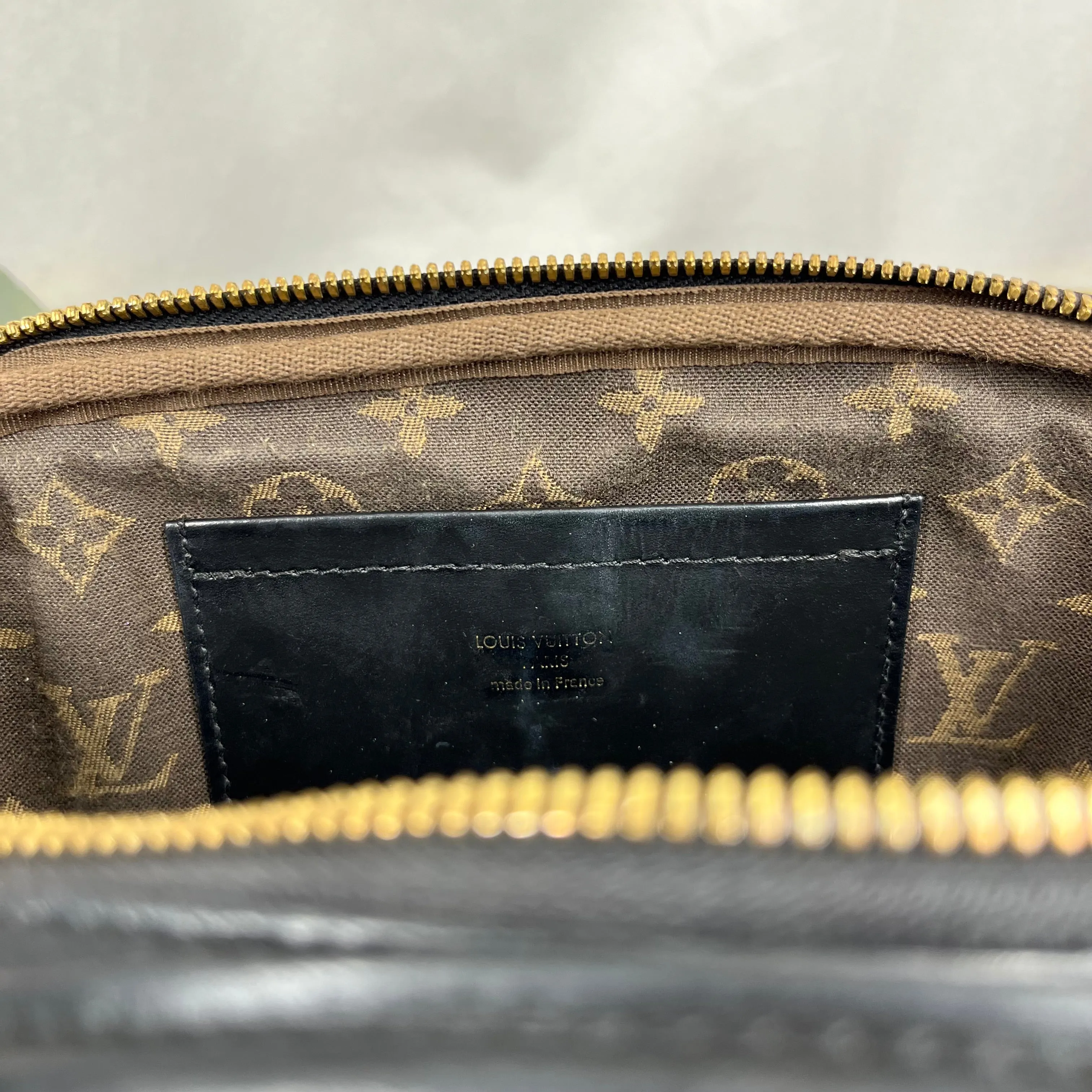 LOUIS VUITTON Monogram Embossed Utility Black Crossbody