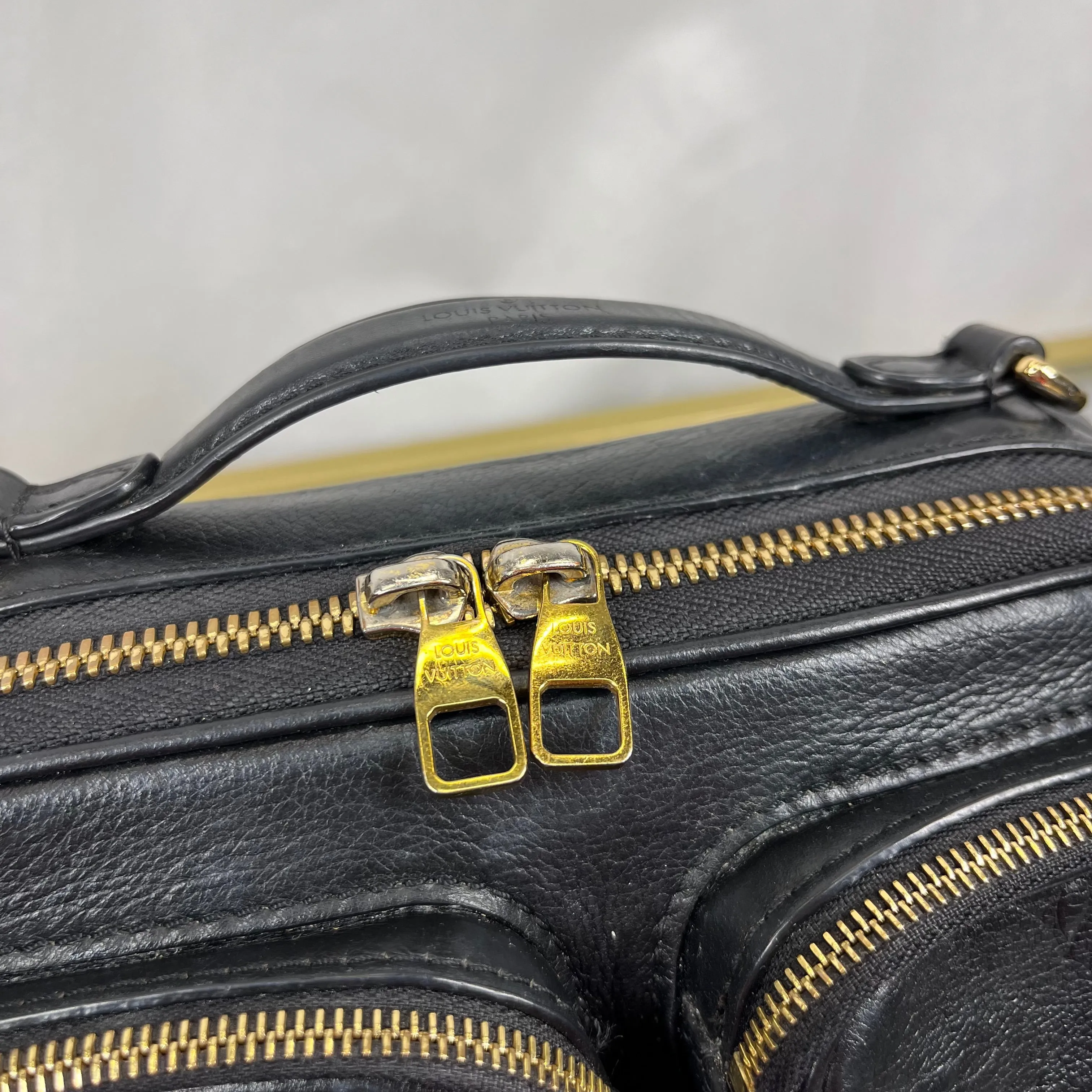 LOUIS VUITTON Monogram Embossed Utility Black Crossbody