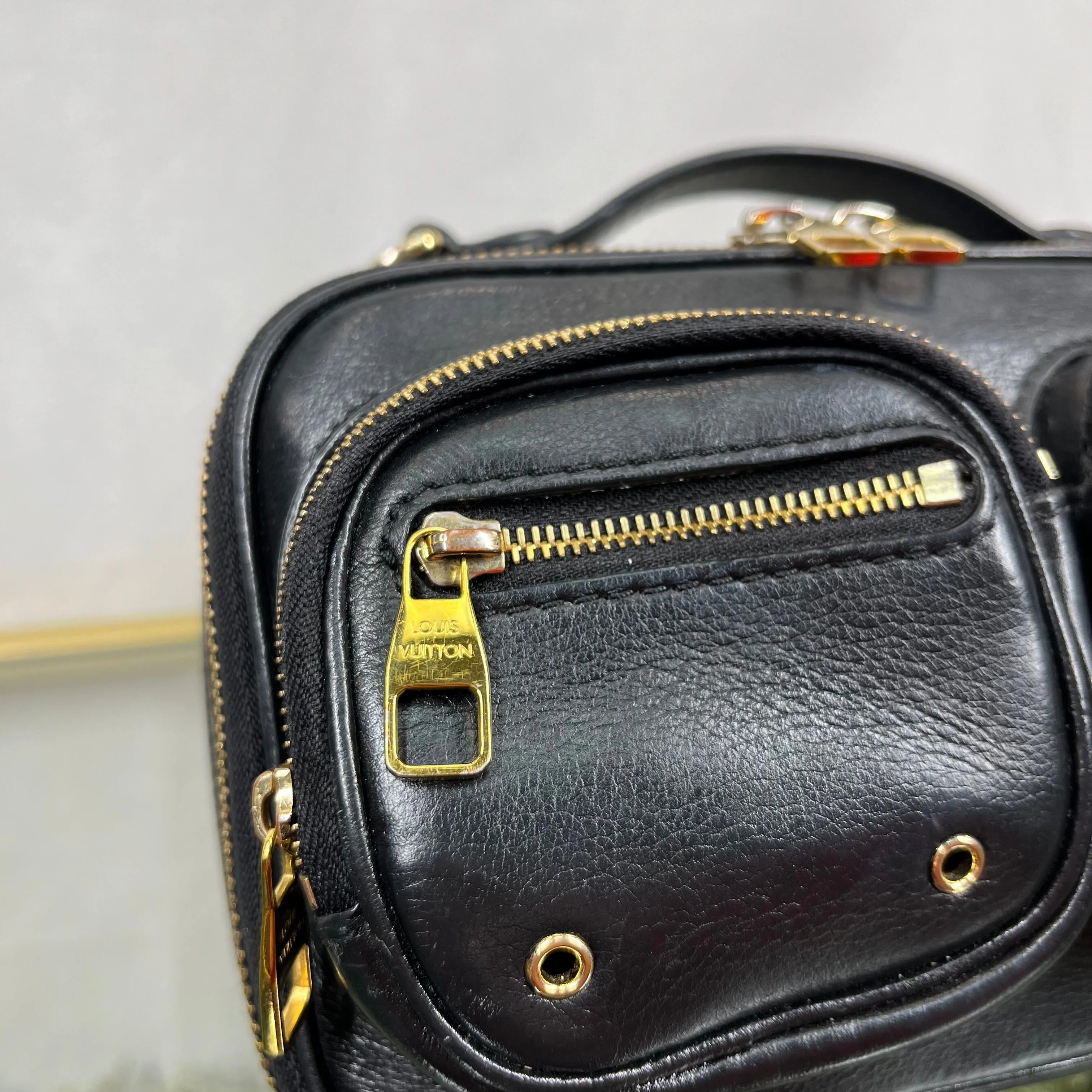 LOUIS VUITTON Monogram Embossed Utility Black Crossbody