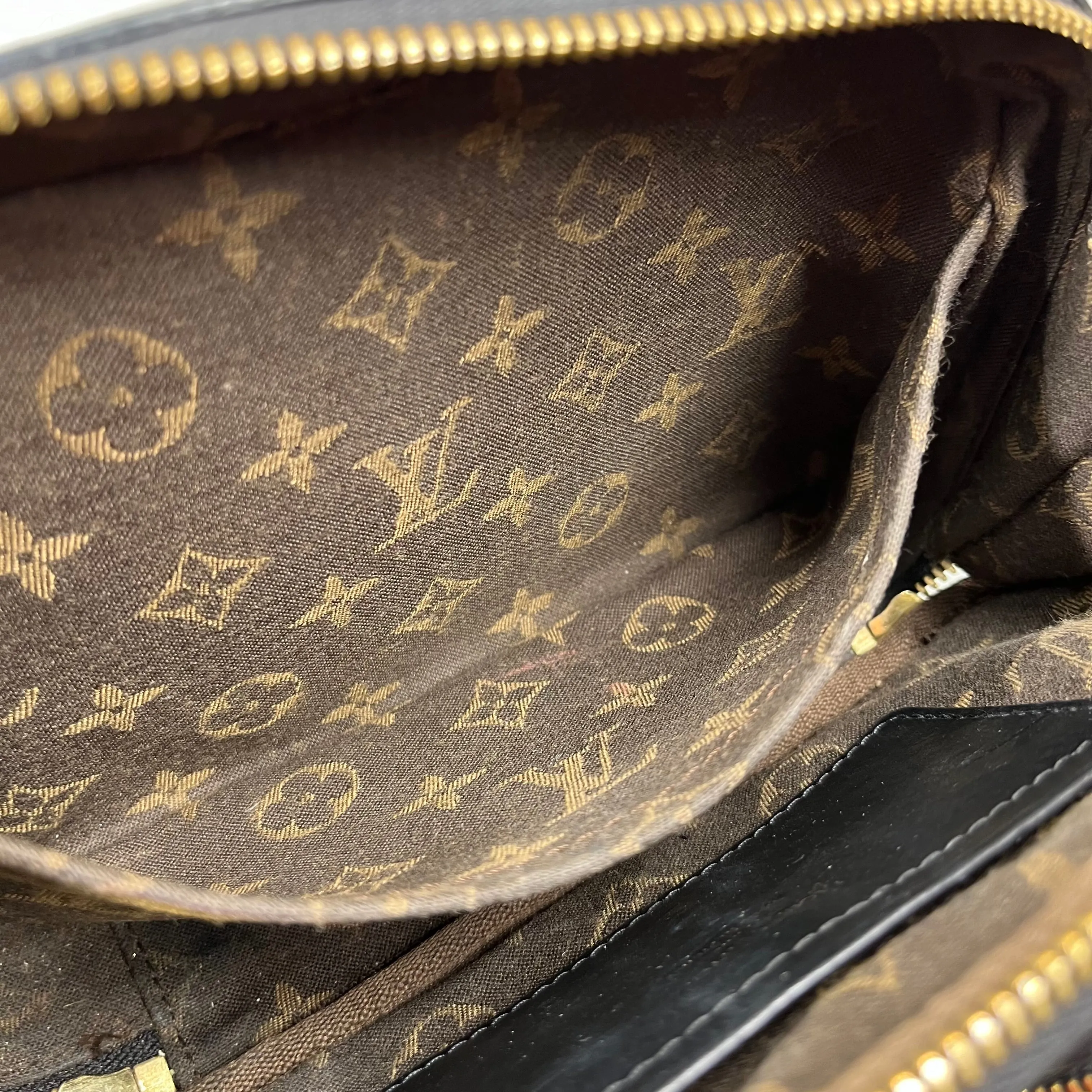 LOUIS VUITTON Monogram Embossed Utility Black Crossbody