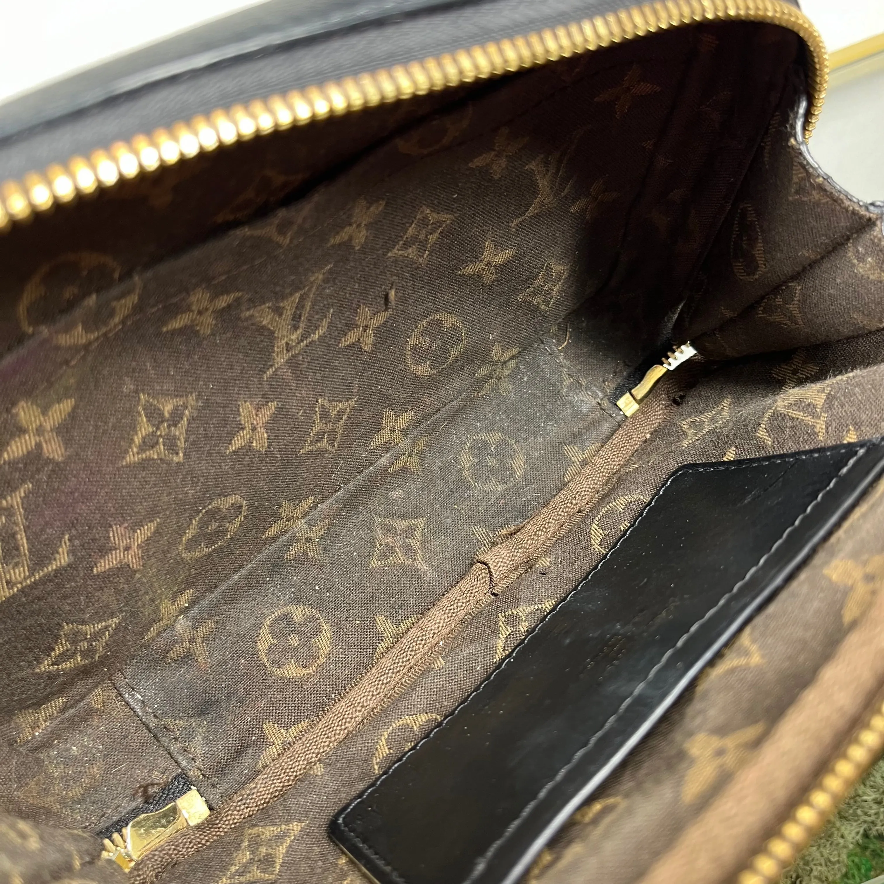 LOUIS VUITTON Monogram Embossed Utility Black Crossbody