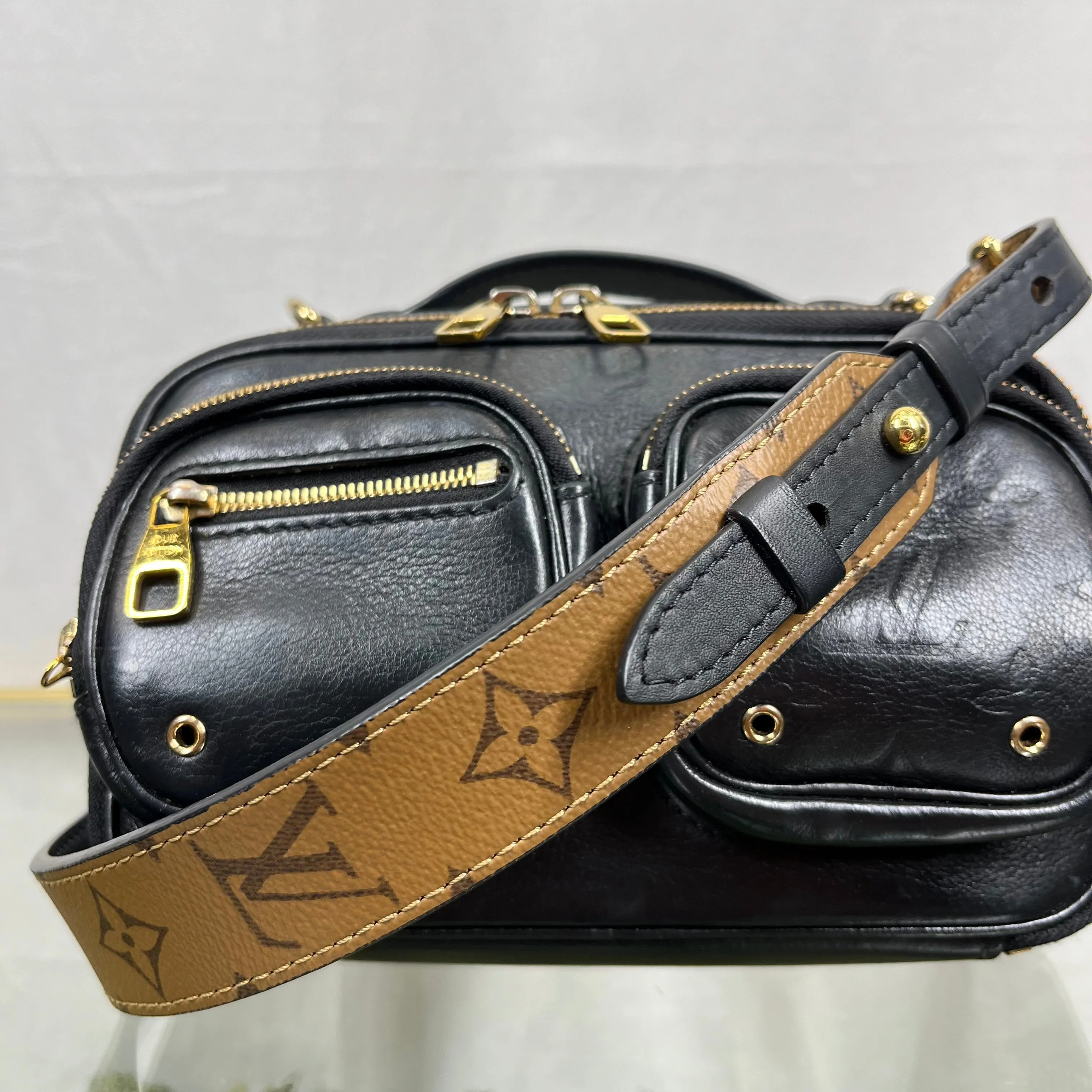 LOUIS VUITTON Monogram Embossed Utility Black Crossbody