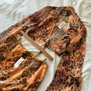 Nasty Gal Animal Print Sheer Bell Sleeve Tie Top 2 Piece Midi Skirt Set