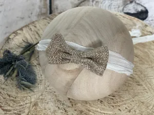 Neutral bow tieback
