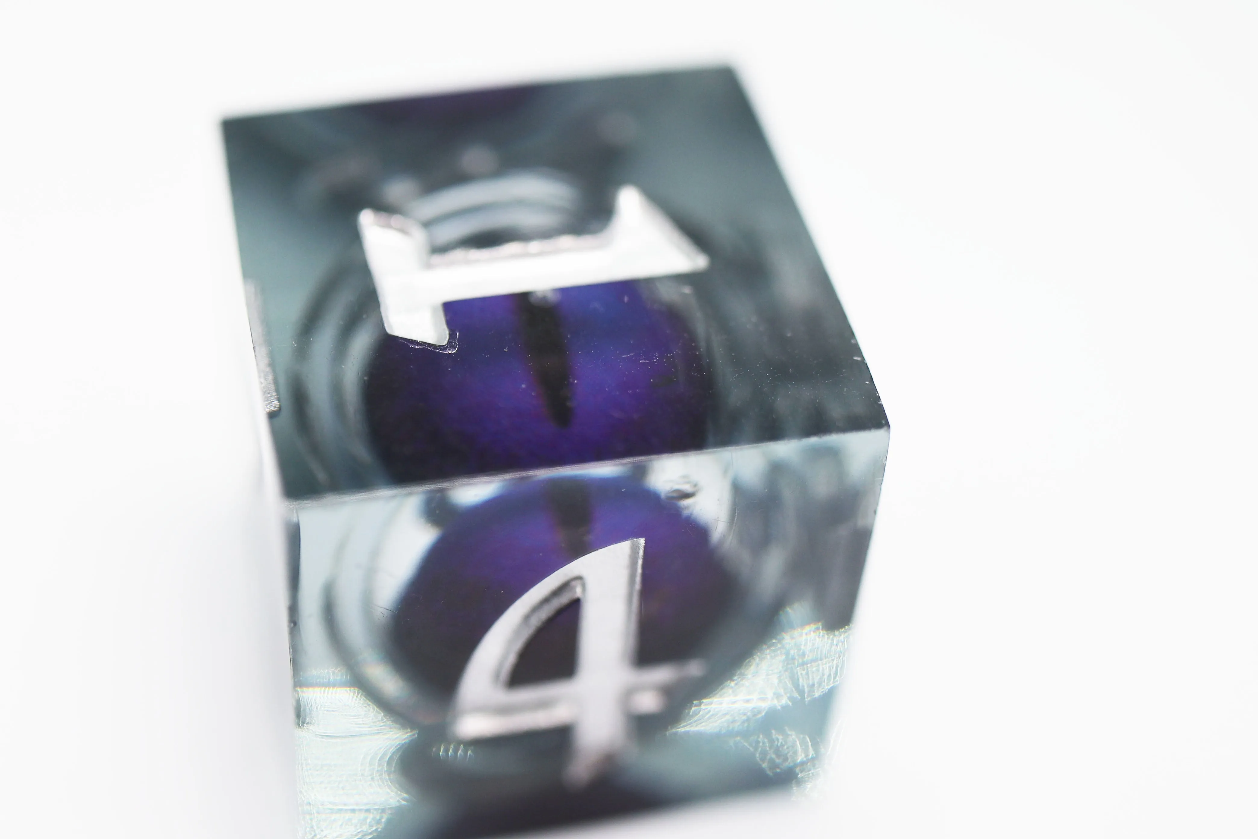 Sharp Edge Moving Eye RPG Dice Set - Purple Cyclops