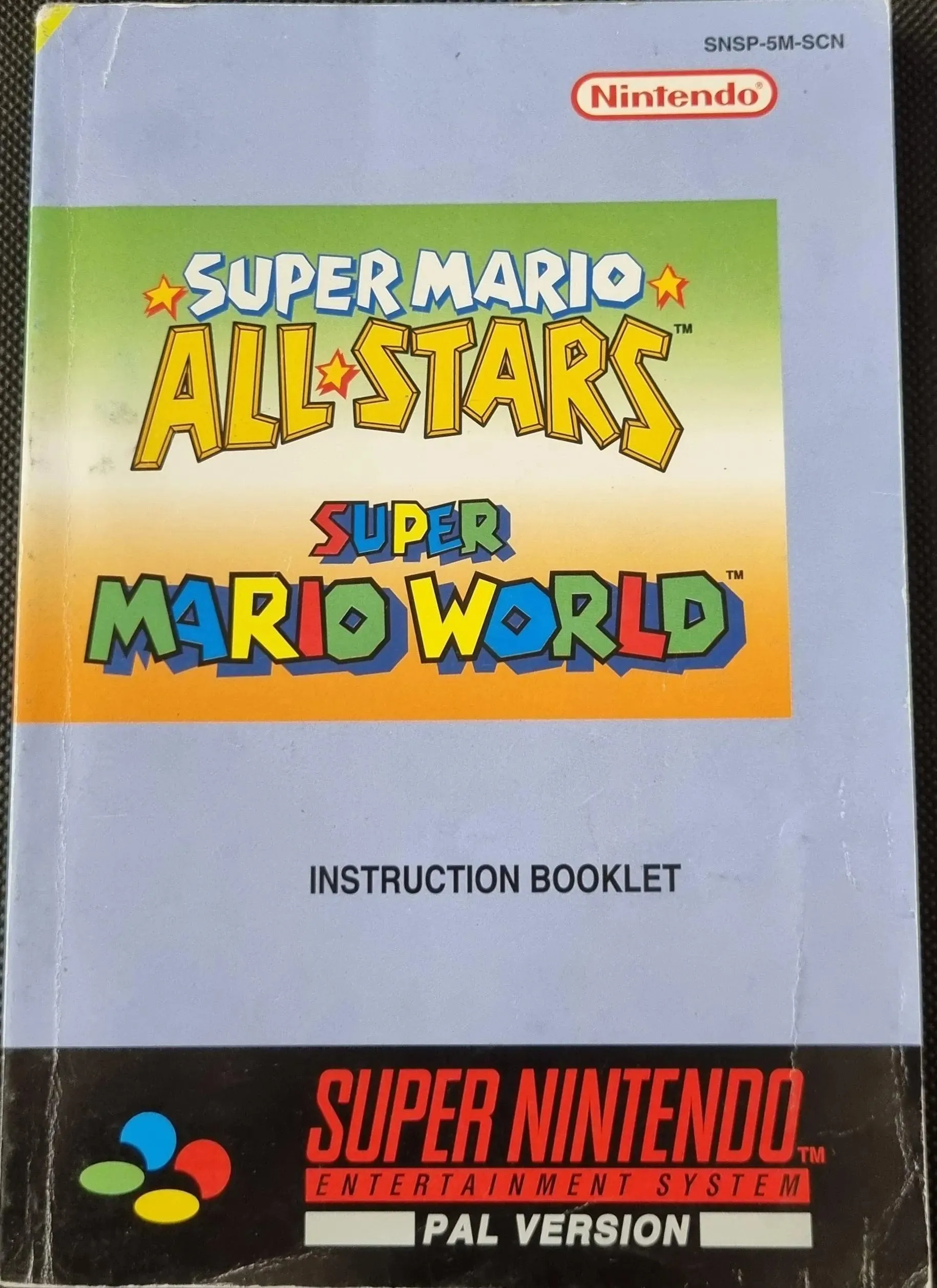 Super Mario All Stars / Super Mario World manual (SCN) (Slidt)